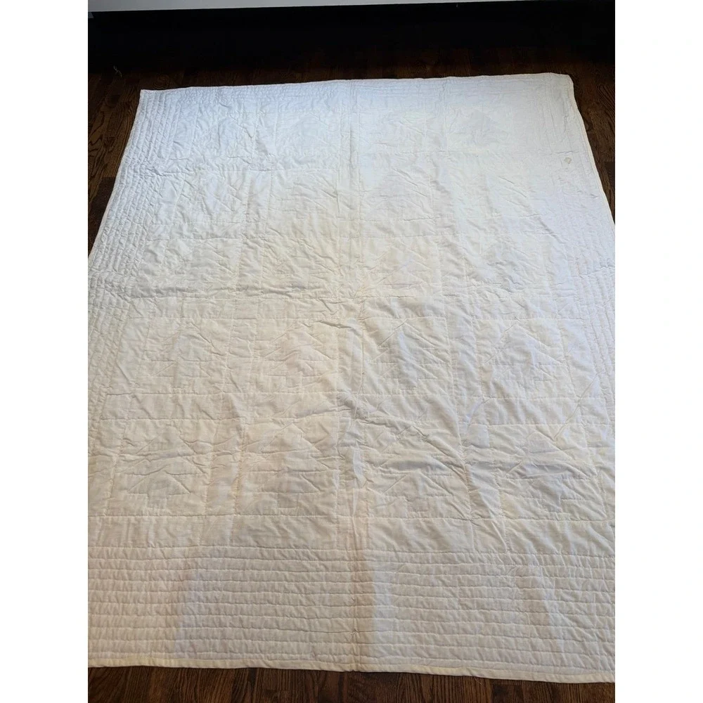 Quilt. Hand quilted.